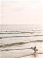 Picture of Surfer on the beach _GroupedProduct_Rectangle_Portrait_Photography _GroupedProduct_Rectangle_Portrait_Unframed_Print_Only_